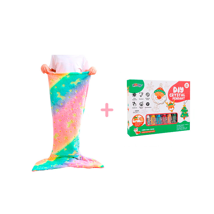 Paket MermaidArtCraft vključuje kar 2 igrači – dekliško odejo v obliki repa morske deklice in božični set za ustvarjanje obeskov!